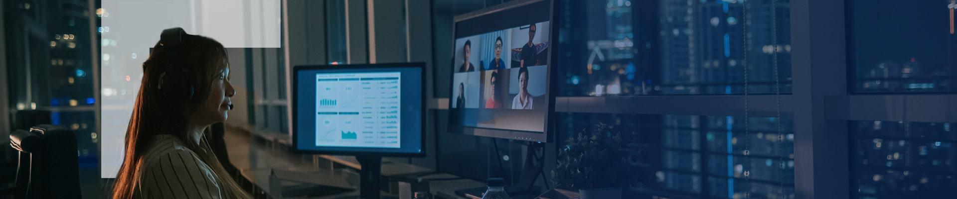 A woman attending an online meeting